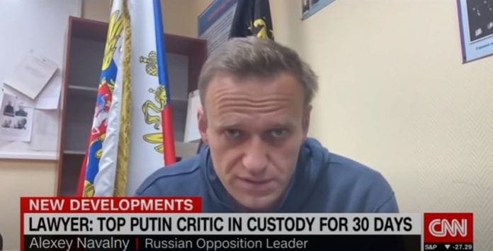 Putin critic Alexey Navalny arrested on his return to Moscow