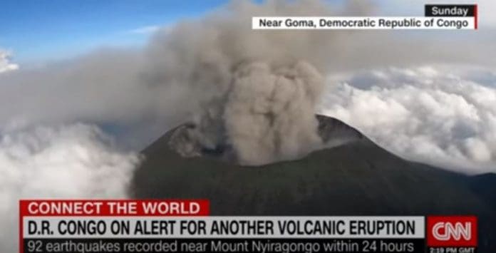 Remarkable aerial video shows volcano spewing ash