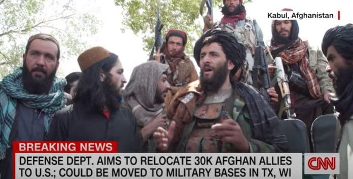 CNN reporter presses Taliban fighter on treatment of women