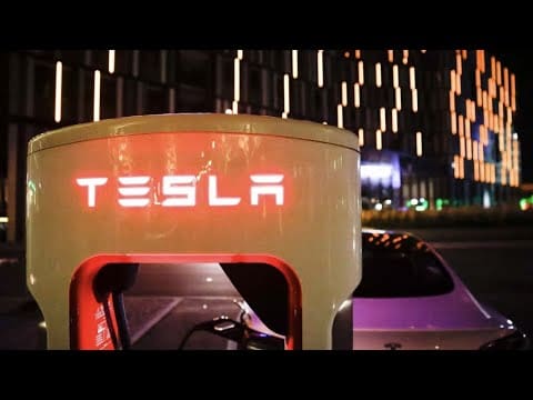 Tesla stock jumps, Micron shares fall, Coinbase planning NFT marketplace launch